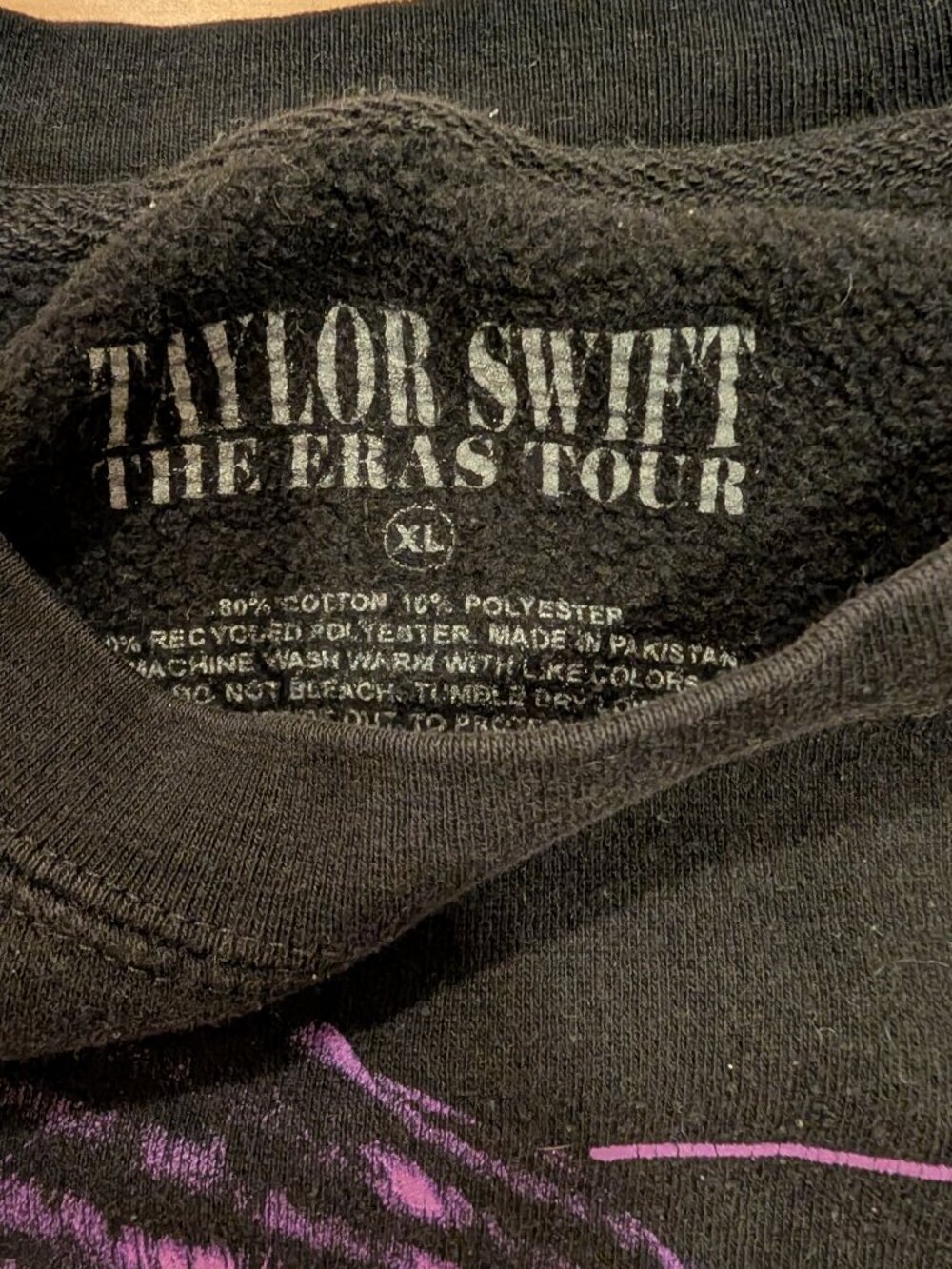 Taylor Swift sweatshirt. Official Eras Tour merch. Black and purple.